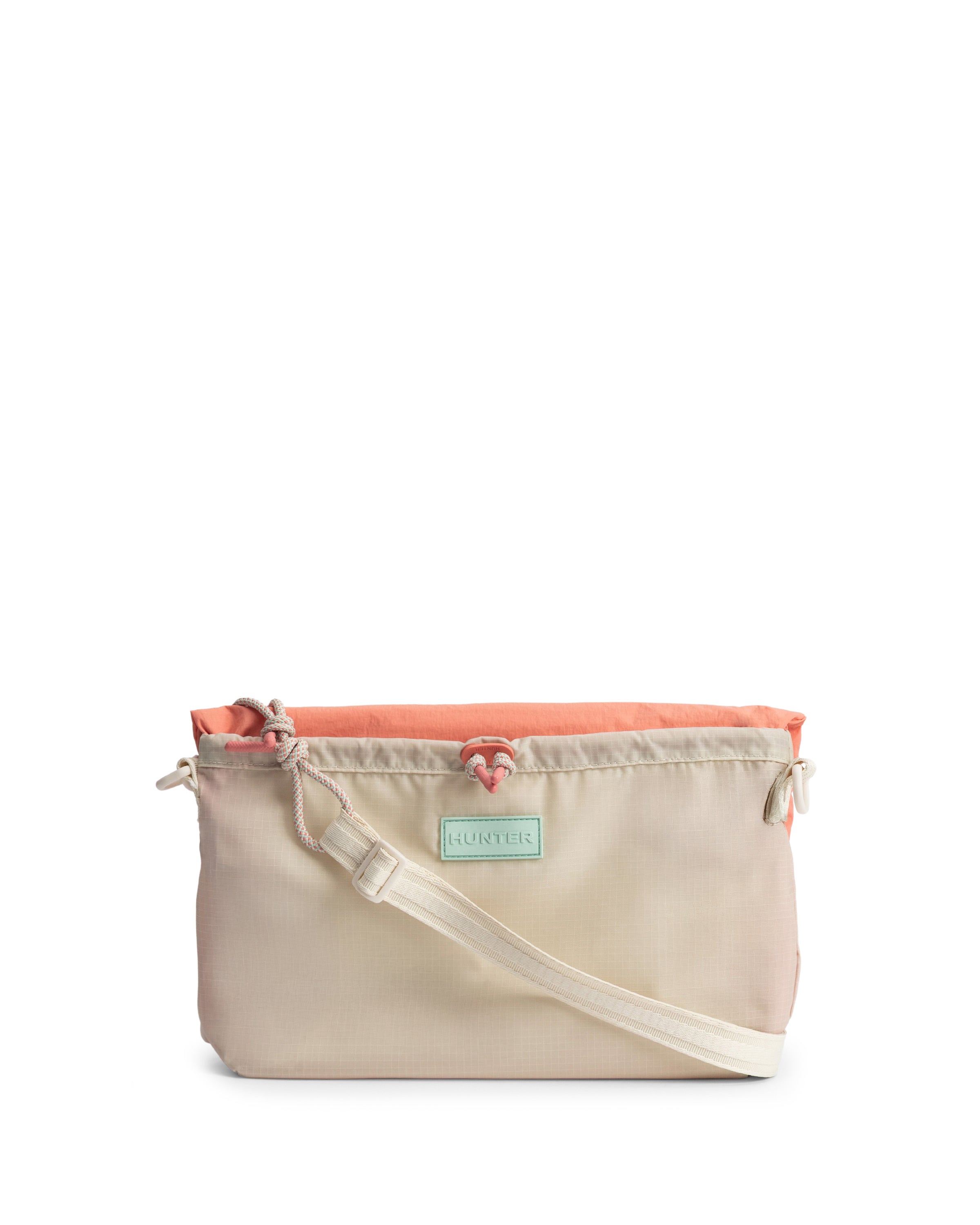 トラベル マルチファンクション サコッシュ - グロウグレープフルーツ